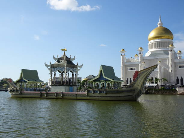 istock Mosque and ceremonial boat on river 1269868201