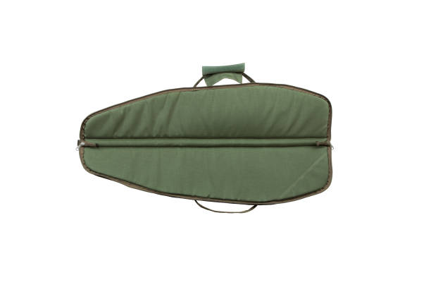 istock Green soft case for guns isolated for white background. Bag for storing and transporting weapons. 1269868535
