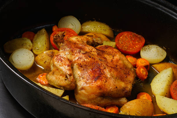 istock Baked home made chicken with vegetables 1269884183
