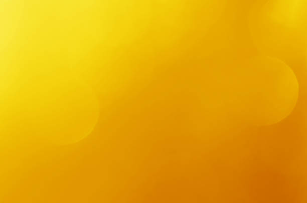 istock glitter light sparkle yellow golden gorgeous bokeh defocused abstract background shiny. 1269888655