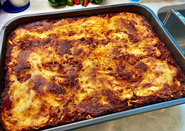 Lasagna-Big Pan Huge family size pan of Lasagna. large pasta pot stock pictures, royalty-free photos & images