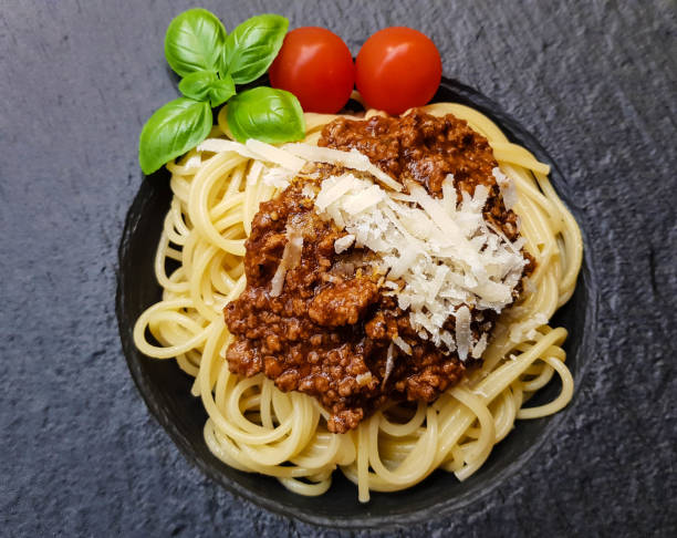 spaghetti bolognese - pasta primavera zdjęcia i obrazy z banku zdjęć