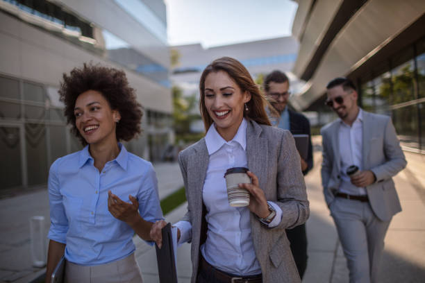 istock Group of young businesspeople on a coffee break 1269896893