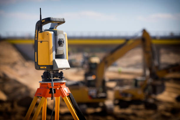 istock Landsurveyor equipment on a highway construction site 1269898190