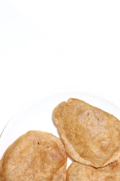 istock Homemade Poori or puri, also known as Indian fried bread 1269898192