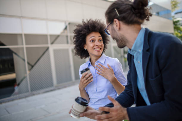 istock Two business people on their way to work 1269898827