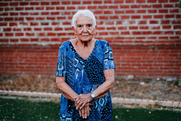 istock portrait of old lady in her 80s relaxed looking into camera 1269898986