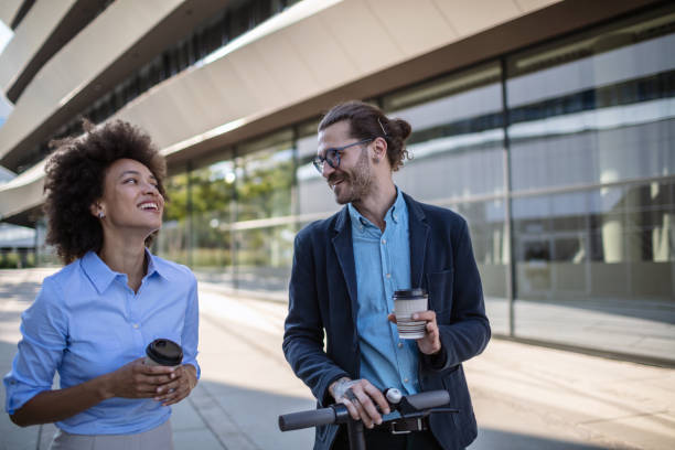 istock Two business people on their way to work 1269899884