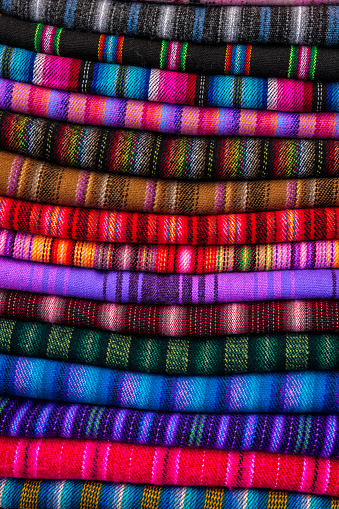 Colorful Peruvian fabrics for sale on  market in Cusco. Cusco is a city in southeastern Peru, near the Urubamba Valley of the Andes mountain range. It is the capital of the Cusco Region as well as the Cusco Province. In 2007, the city had a population of 358,935 which is triple the figure of 20 years ago. Located on the eastern end of the Knot of Cusco, its altitude is around 3,400 m (11,200 ft). Cusco is the historic capital of the Inca Empire and was declared a World Heritage Site in 1983 by UNESCO. It is a major tourist destination and receives almost a million visitors a year. It is designated as the Historical Capital of Peru by the Constitution of Peru.