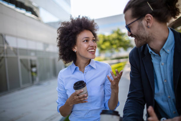 istock Two business people on their way to work 1269900116