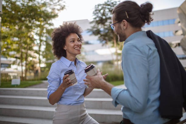 istock Two young business people on a coffee break 1269900459