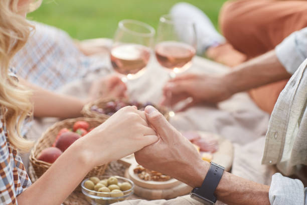 istock Couple Drinking Wine Outdoors 1269900847