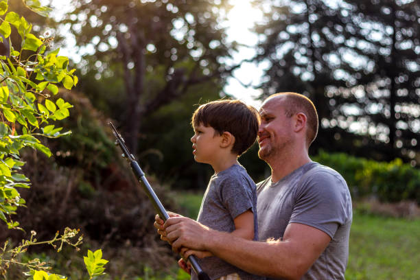istock Happy father with his son working in the garden. 1269902413