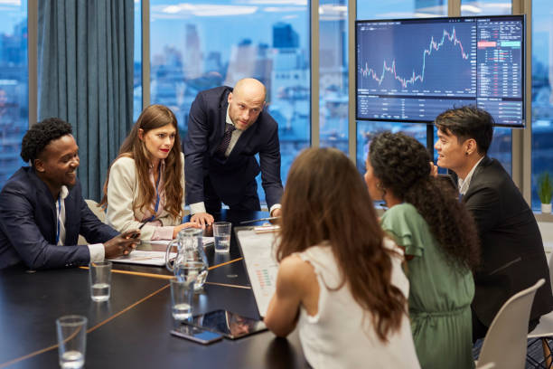 istock Business coach working with multi ethnic team. Friendly consultations 1269902486