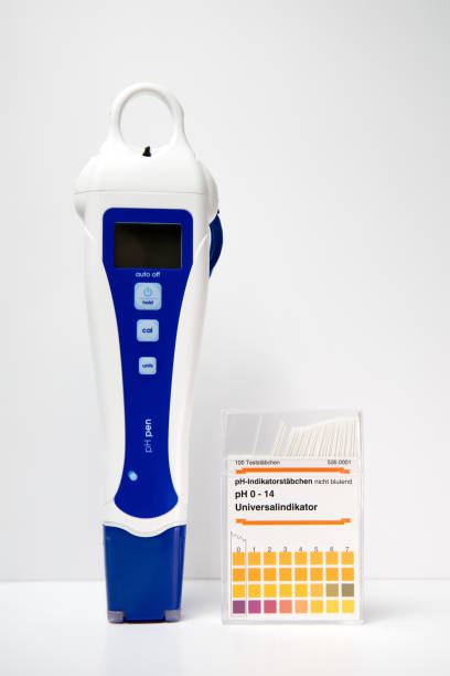 istock A modern digital pH meter next to a box of paper pH strips. pH measuring. 1269902584