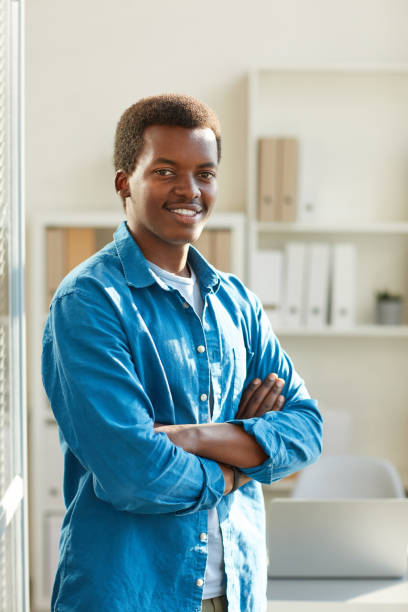 istock Young African-American Intern in Sunlit Office 1269902717