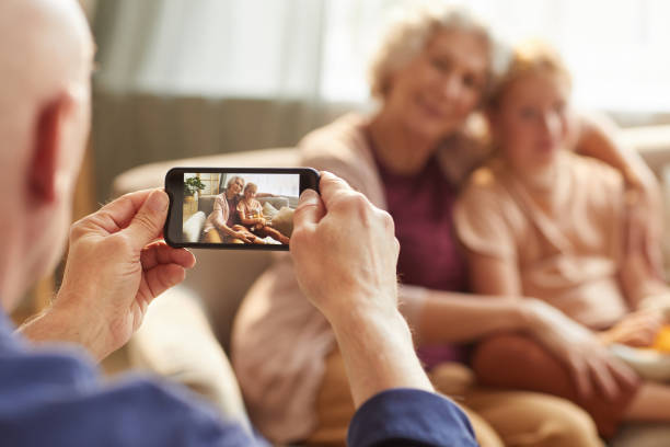 istock Senior Man Taking Smartphone Photo 1269904259