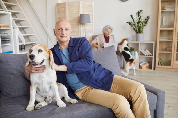 istock Senior Man Posing with Loving Pet 1269904363