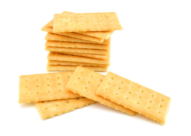 istock Salty crackers in square shape on white background 1269905326