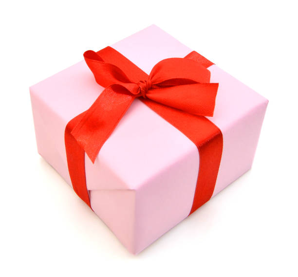 istock A pink gift box and red bow on white 1269909230