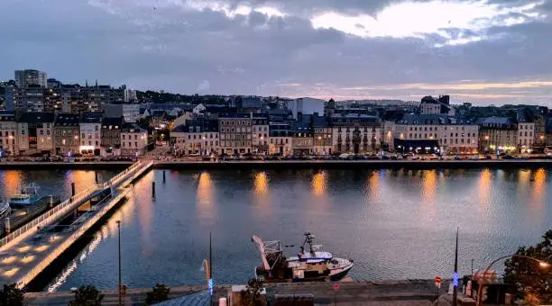 France.Cherbourg in Cotentin. View of the commercial basin and its night lights and its famous illuminated footbridge.