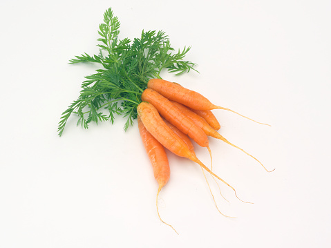 meyve vs 0021Organic Fresh carrots on wooden table background.