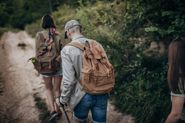 istock Friends hiking together in nature 1269919320