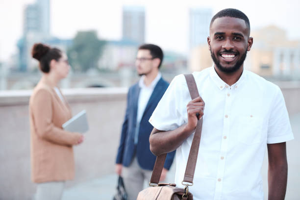 istock Cheerful Afro-American student guy 1269919684