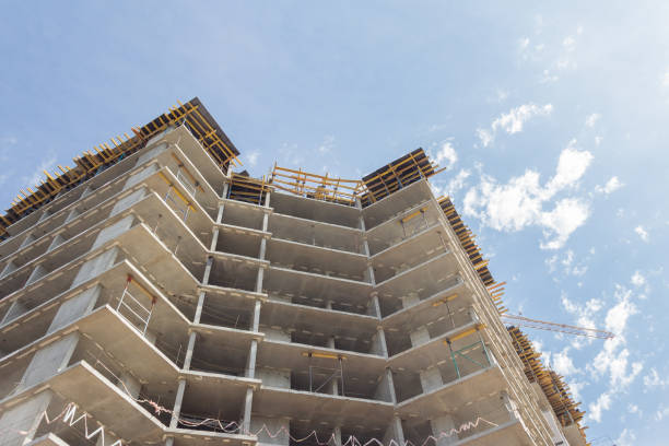 istock Building under construction. Construction of a concrete apartment building. Modern construction 1269921352