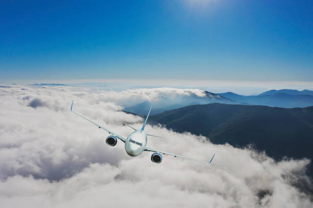 istock Passenger jet airplane flying above clouds. 1269931777