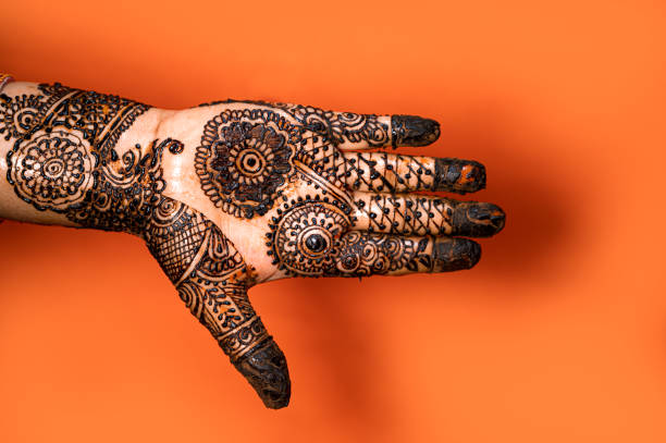 istock Human hand decorated with henna tattoo 1269932768