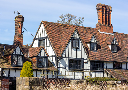 Timber-framed farmhouses such as this were built by rich Yeoman farmers between the 14th and 16th centuries, which equates to late medieval and Tudor eras. This particular building on Doric Avenue has served recently as a pub and an Indian and Turkish restaurant.