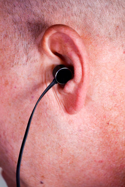 istock Ear pods inside the ear of a man 1269933498