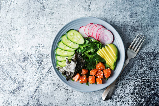 istock Salmon cucumber avocado Poke bowl 1269940105