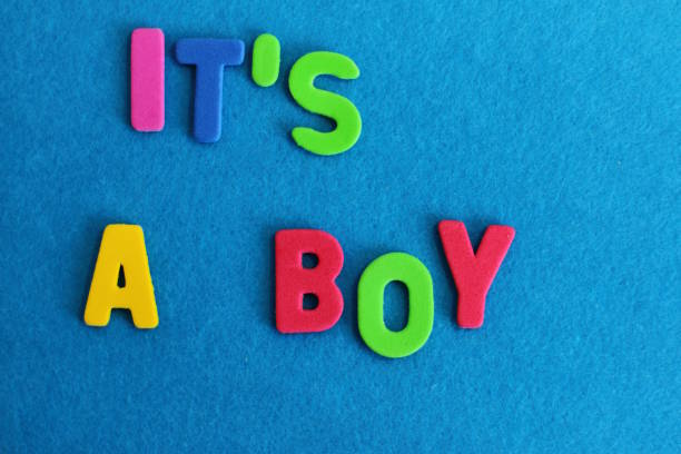 istock It Is A Boy, colorful letters, it is a boy is written on blue background 1269940181
