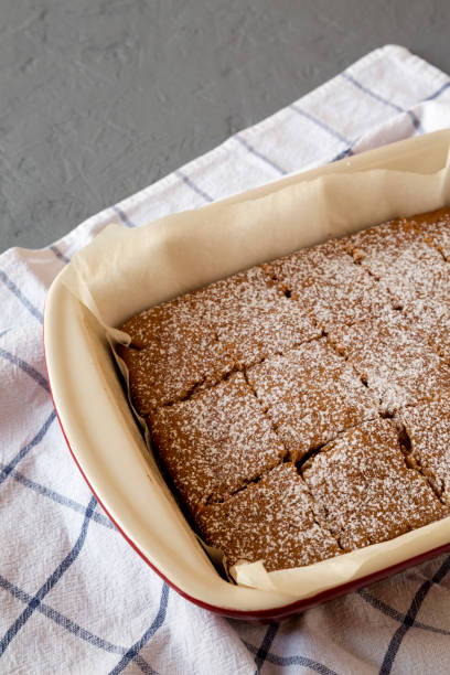 istock Homemade Tasty Applesauce Cake on a gray background, low angle view. Copy space. 1269941864