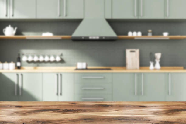 istock Table in blurry grey kitchen with countertops 1269941915