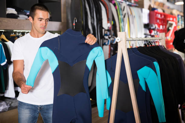 istock Young male chooses sportswear 1269942289