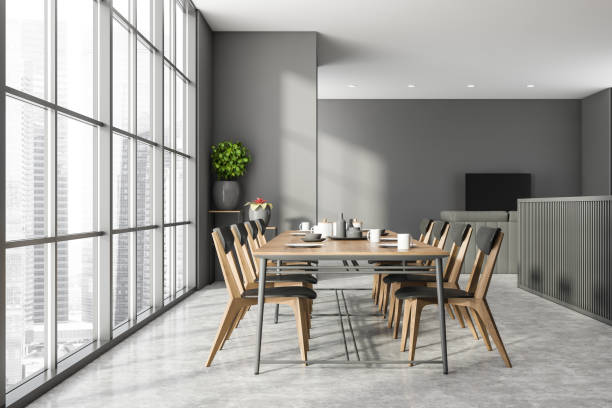 istock Dining table in grey kitchen and living room 1269942505