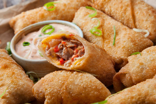 istock Cheeseburger Egg Rolls with Ketchup and a Spicy Mayo Dipping Sauce 1269945921
