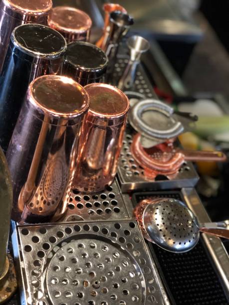 istock Copper Cups Strainers and a Fruit ready for a busy bar night 1269950464