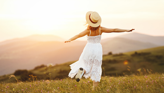 Happy Woman Dancing And Spinning With Her Back On Sunset In Nature Stock Photo - Download Image Now - iStock Happy Woman Dancing And Spinning With Her Back On Sunset In Nature Stock Photo - Download Image Now - iStock