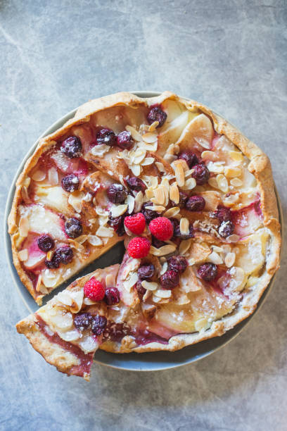 istock Galette with pear, berries, almonds shot from above 1269957506