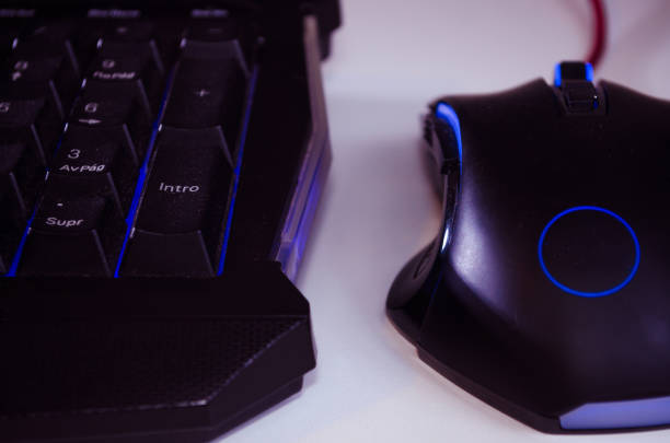 istock Part of keyboard and mouse close up. Pc design for gamers. Game and programming concept. 1269957871