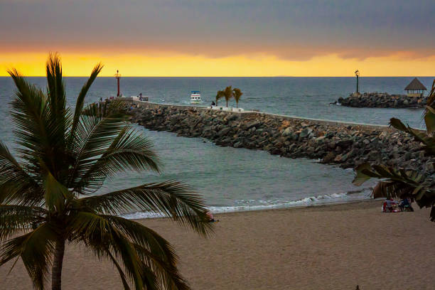 View of the cloudy sunset from the pier in Nuevo Vallarta, Nayarit.