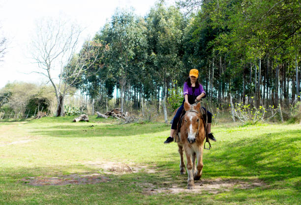 istock girls on horseback 1269960861