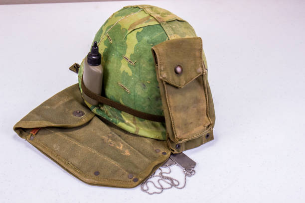 istock Vietnam War Era Helmet, Dog Tags And Ammo Pouch 1269965342