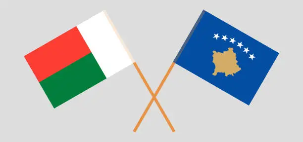 Vector illustration of Crossed flags of Kosovo and Madagascar