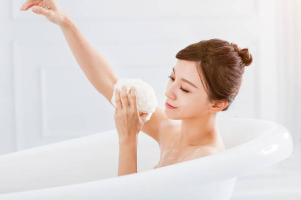 istock young woman take a bath in bathtub 1269972009