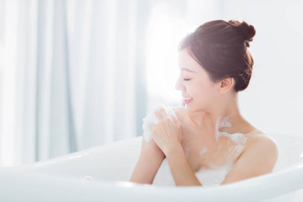 istock young woman take a bath in bathtub 1269972031